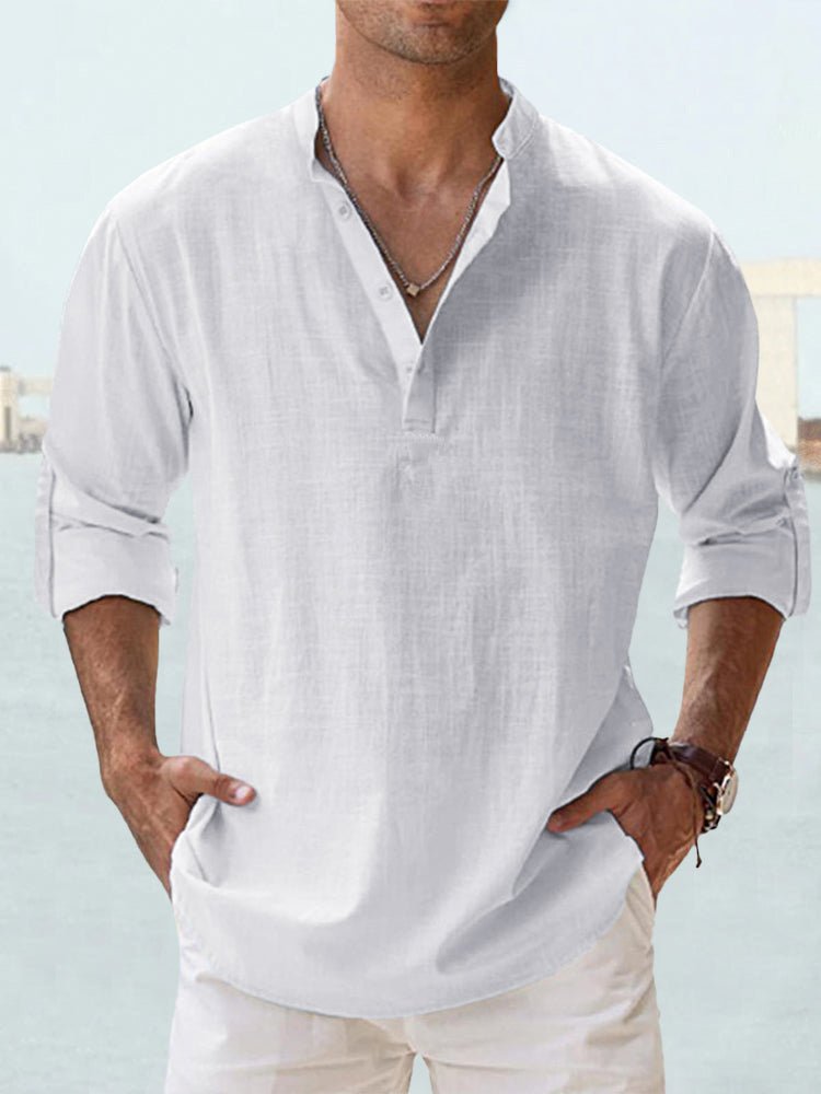 White linen men's henley shirt with rolled sleeves, beach casual style