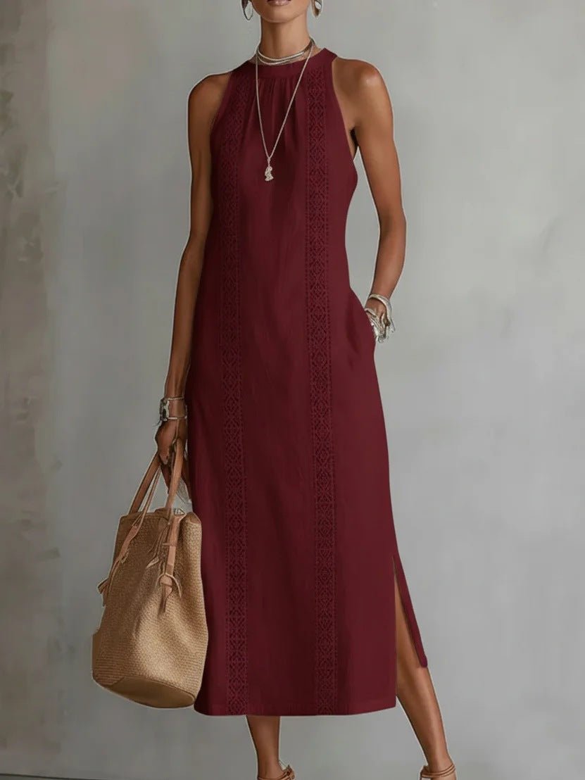 Burgundy sleeveless midi dress with lace trim, side slit, and pocket, paired with woven tote bag